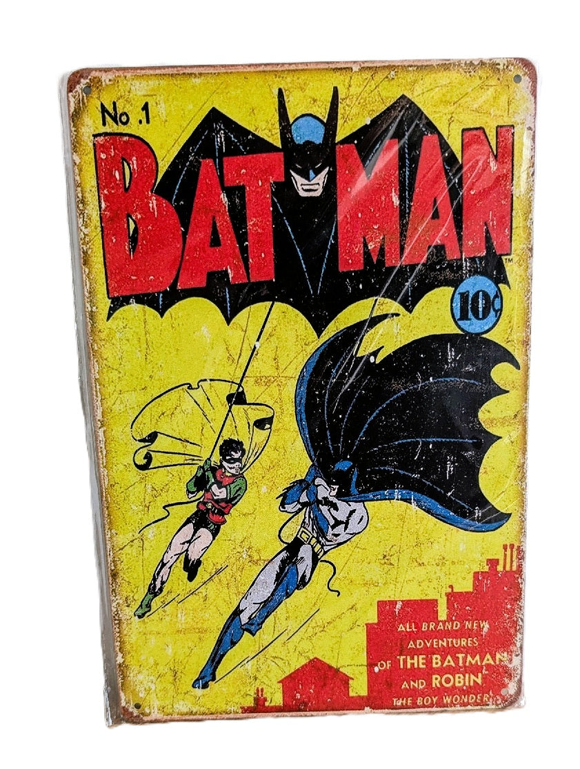 Vertical vintage-style metal wall sign featuring the classic 1940 Batman No. 1 comic cover art with Batman and Robin swinging against a yellow background, featuring bold red 'BATMAN' typography and heavy distressed rusted edges.