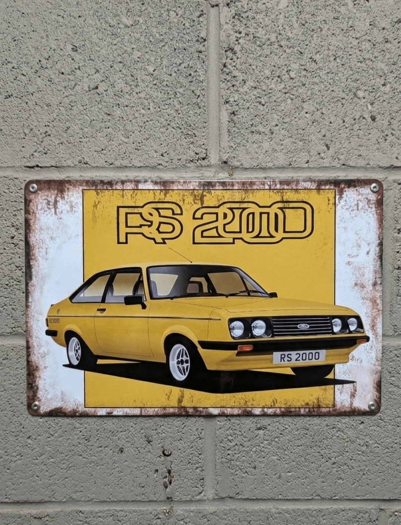 Vintage metal wall sign featuring a yellow Ford Escort RS2000 MK2 with a heavily distressed and rusted effect for garage or workshop decor