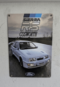Metal wall sign featuring a high-definition photograph of a white Ford Sierra RS Cosworth on a track, with the RS Cosworth logo and Ford oval branding.