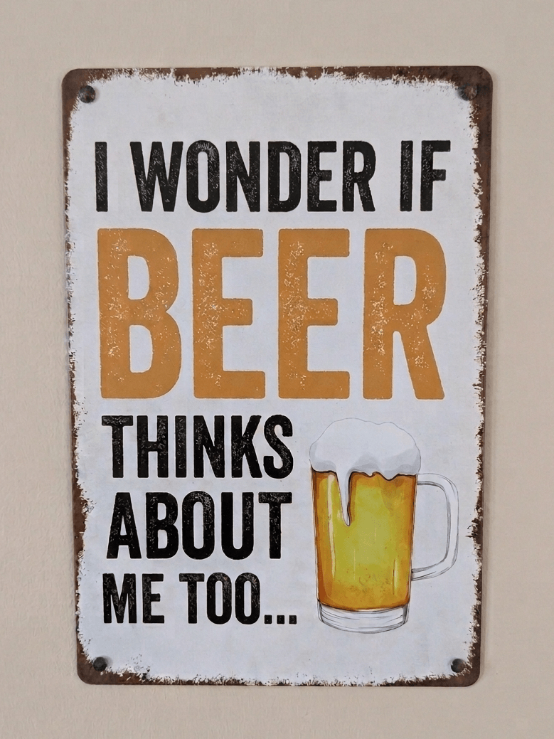 Vertical vintage-style metal wall sign with the text 'I WONDER IF BEER THINKS ABOUT ME TOO...' in black and amber-gold typography, featuring an illustration of a frothy beer mug on a distressed white background with rusted edges.