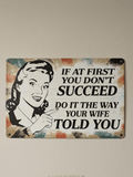 Funny vintage-style metal wall sign with an illustration of a woman and the quote If at first you don't succeed do it the way your wife told you