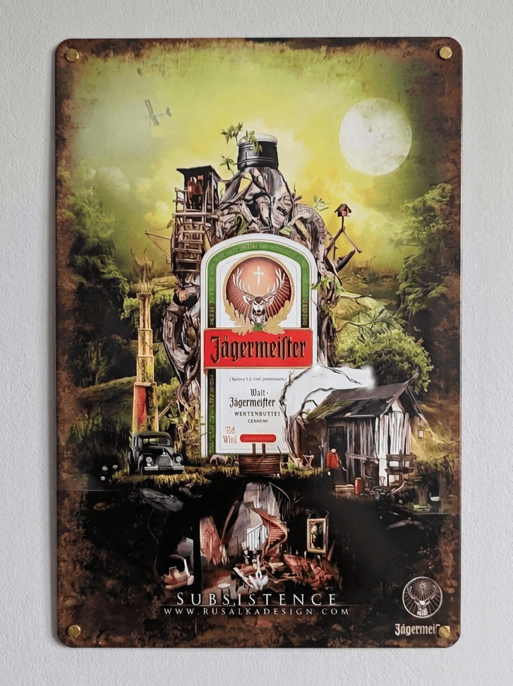 Vertical vintage-style metal wall sign for Jägermeister in protective plastic wrap, featuring a highly detailed, surreal fantasy landscape illustration titled 'SUBSISTENCE' by Rusalka Design, centered around a classic herbal liqueur bottle with heavy faux-rust distressed borders.