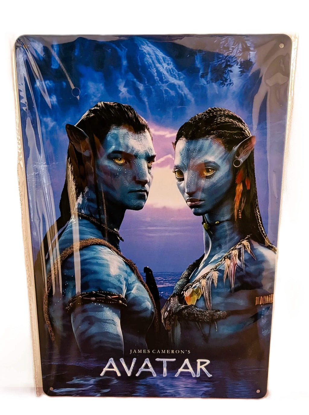 Vertical glossy metal wall sign for James Cameron's Avatar movie in protective plastic wrap, featuring a high-definition promotional portrait of Jake Sully and Neytiri on the alien world of Pandora under a twilight sky.