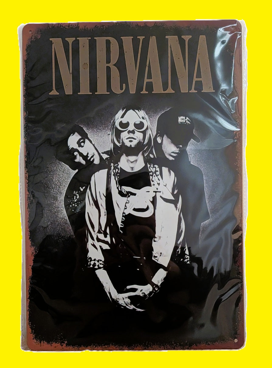 Vertical metal wall sign featuring a black and white stylized portrait of the band Nirvana, with Kurt Cobain in the center wearing large sunglasses, under the band's name in tan serif typography with a distressed rusted border.