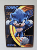 Vibrant metal wall sign featuring Sonic the Hedgehog from the Sonic 2 movie, with a high-action pose against a golden ring and blue background