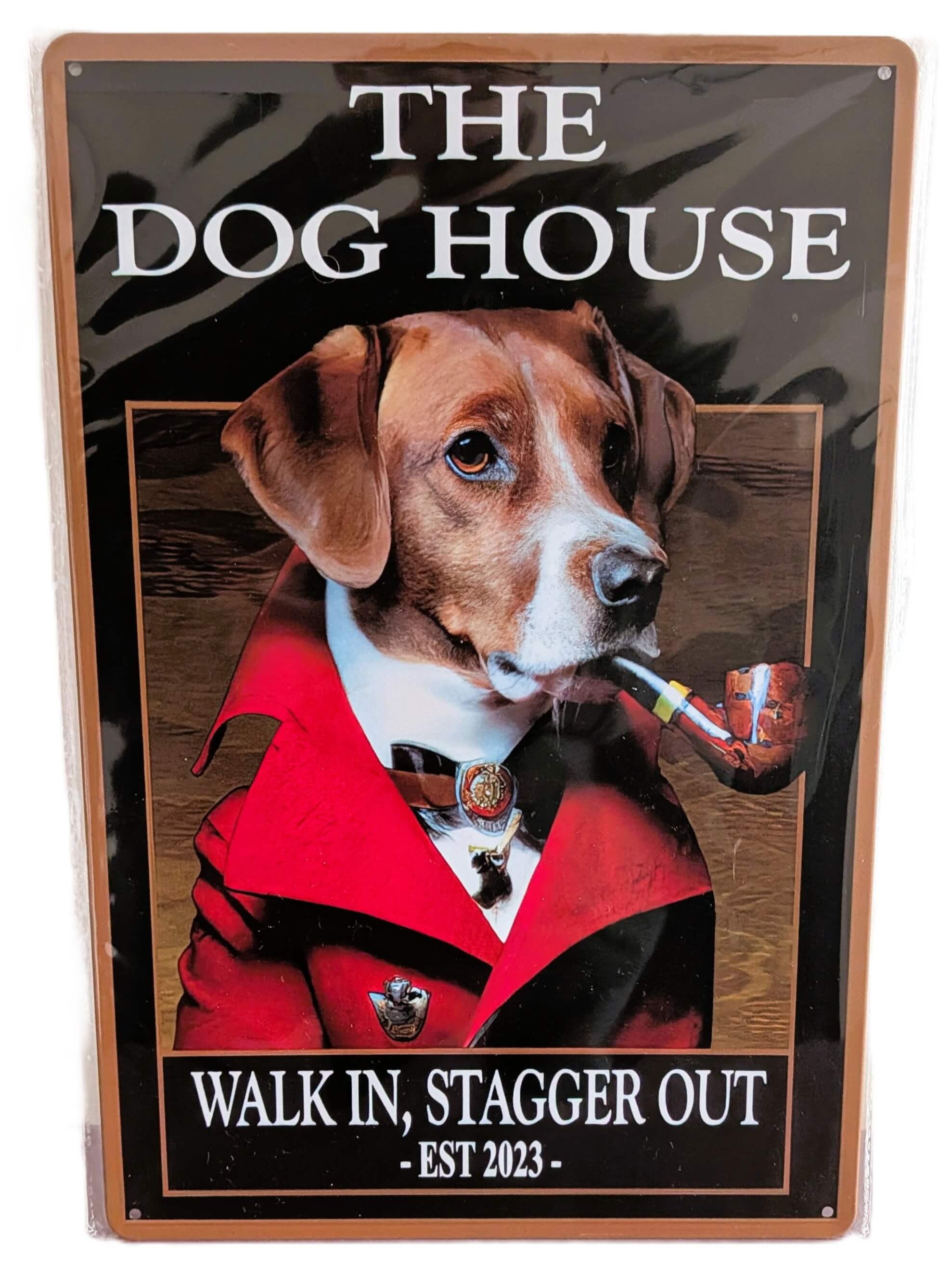 Vertical glossy metal wall sign in protective plastic wrap reading 'THE DOG HOUSE' at the top and 'WALK IN, STAGGER OUT - EST 2023 -' at the bottom, featuring a portrait of a regal hound dog wearing a red smoking jacket and holding a wooden tobacco pipe.