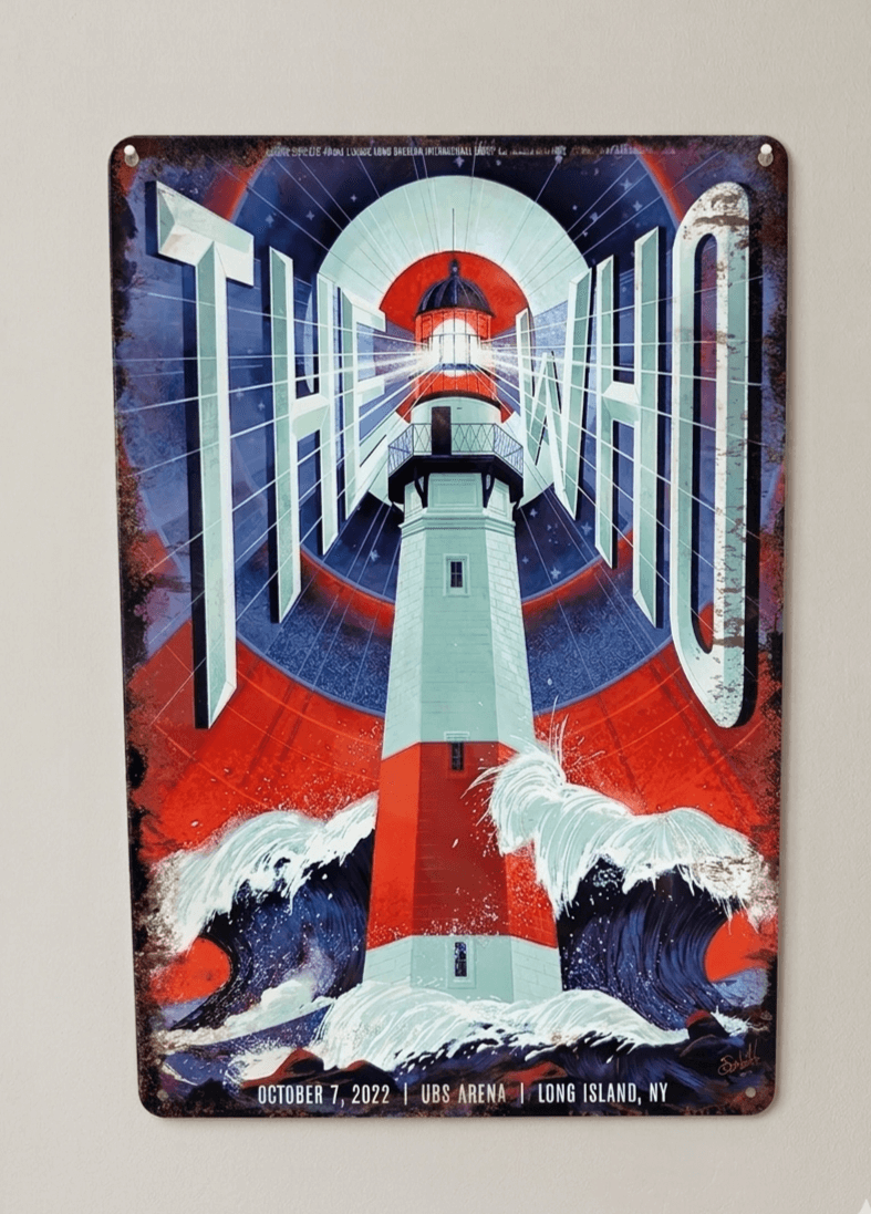 Vintage-style concert poster metal sign for The Who at UBS Arena Long Island, featuring a tall lighthouse amidst crashing waves and a distressed, rusted border