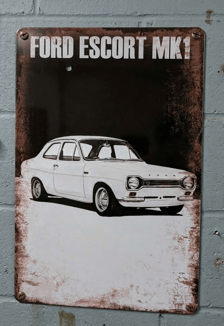 Vintage-style vertical metal wall sign for the Ford Escort MK1, featuring a detailed white illustration of the classic car on a dark, weathered background with rusted, distressed edges.