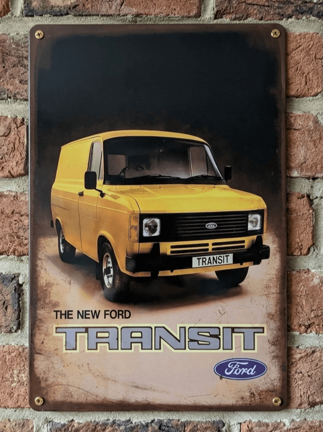 Vintage-style vertical metal wall sign for 'The New Ford Transit' featuring a yellow Mk2 van against a dark background with heavily distressed, rusted edges.