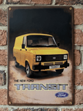 Vintage-style vertical metal wall sign for 'The New Ford Transit' featuring a yellow Mk2 van against a dark background with heavily distressed, rusted edges.