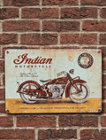 Vintage-style metal wall sign featuring a red Indian Scout 45 motorcycle with heavy rust distressing and the Indian Motorcycle 1901 logo