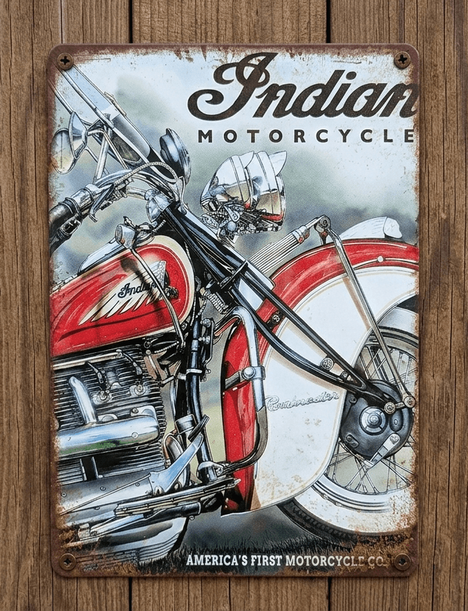 Vertical vintage-style metal wall sign mounted on a rustic wooden background, featuring a highly detailed illustration of a classic red and cream Indian cruiser motorcycle showcasing its front wheel, engine, and swept fender beneath bold script branding and heavily rusted edges.