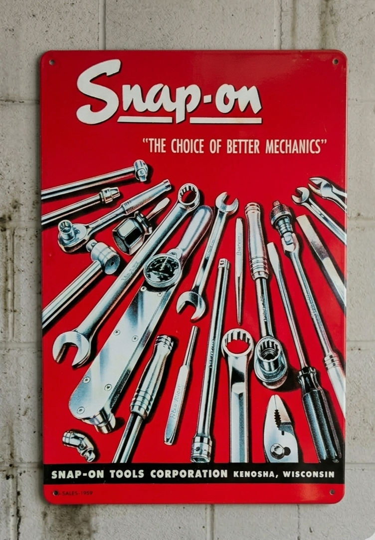 Vintage-style vertical red metal wall sign for Snap-on Tools featuring various chrome wrenches, ratchets, and sockets with the slogan 'The Choice of Better Mechanics' and Kenosha, Wisconsin branding.