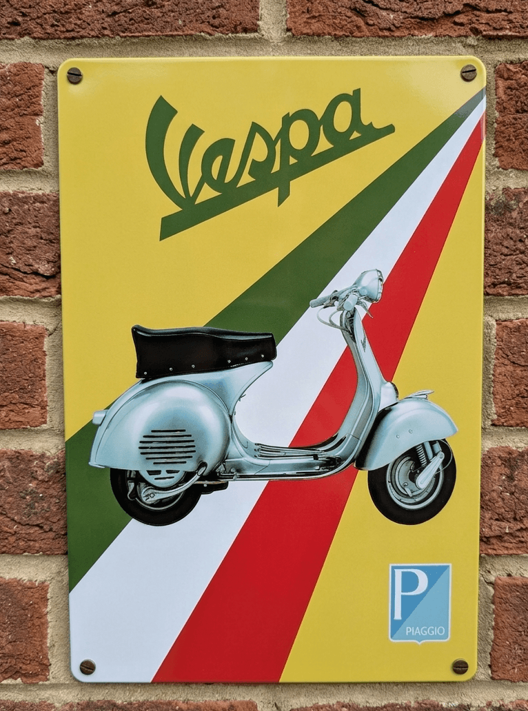 Vertical metal wall sign for Vespa featuring a classic light blue scooter over a diagonal green, white, and red Italian flag background with a yellow top section and Piaggio logo.